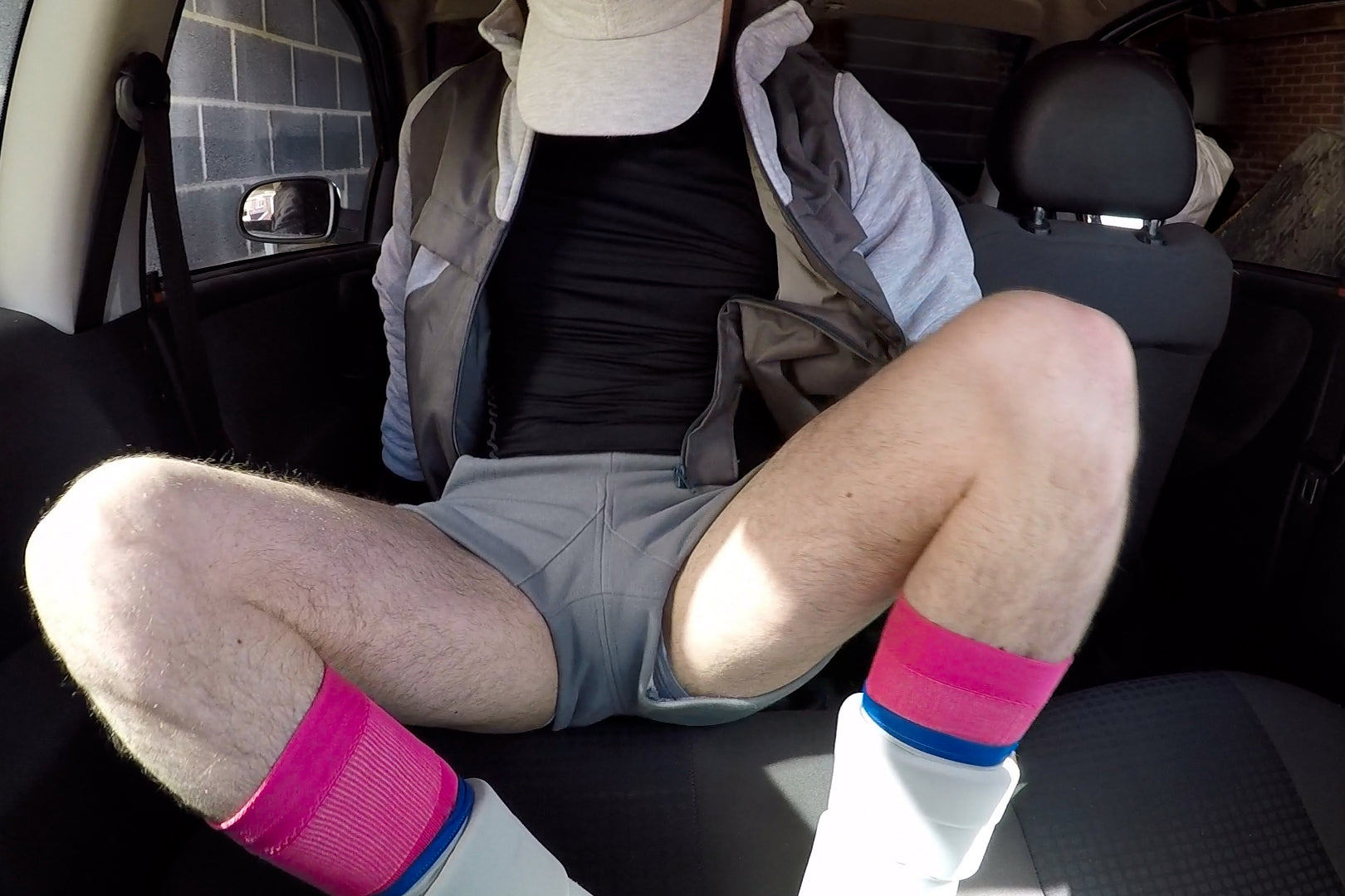 Person wearing AW25 baseball cap, Homer parka, bubble shorts and foamiator boots